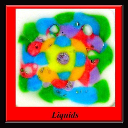 Figure 6. Liquids. An artistic display demonstrating the ease of embedding liquids, not only in a three-dimensional block but also in specific orientation. Liquids prepared from embedding medium colored with food dye. Figure 6. Liquids. An artistic display demonstrating the ease of embedding liquids, not only in a three-dimensional block but also in specific orientation. Liquids prepared from embedding medium colored with food dye.