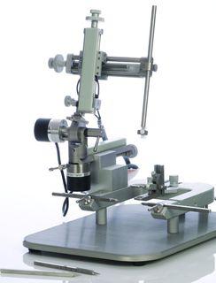 A modern stereotaxic instrument helps to improve accuracy in small animal brain surgery.